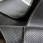 Black carbon fiber composite product material background