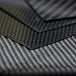 Black carbon fiber composite product material background