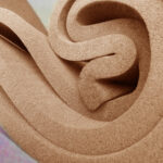 sponge foam bundle. Brown sponge foam folds in irregular and complex rolls