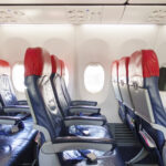 Background of airplane row empty seats onboard , travel and transportation concept