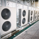 Cooling Air Condition Unit and Control System, Air Condenser Engine Station Outside Building of HVAC Systems. Electrical Compressor Fan Coil of Air Conditioning Equipment for Home Residential Units.